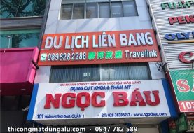 Bảng hiệu Ngọc Báu và Du lịch Liên Bang: hai biển trên một mặt tiền Trần Hưng Đạo