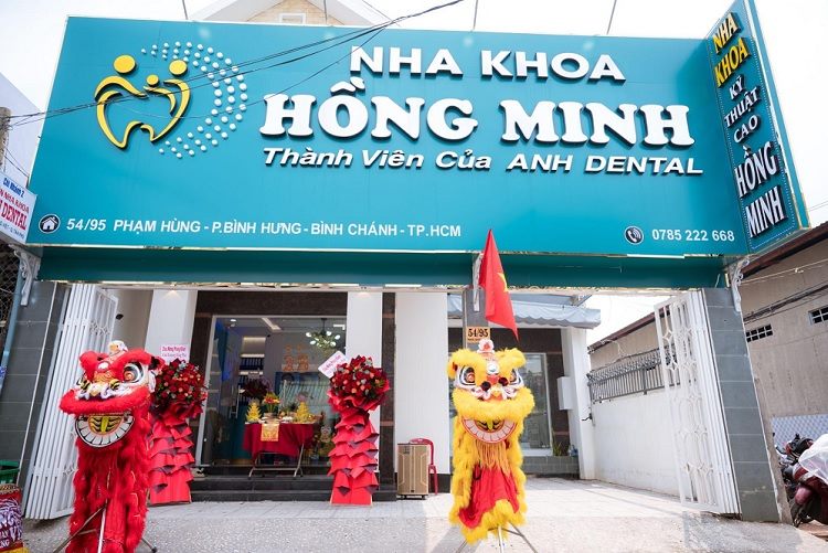 Bảng hiệu nha khoa nền xanh ngọc chữ trắng, logo răng và bảng dọc