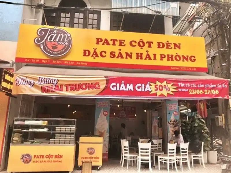 Bảng hiệu Pate cột đèn đặc sản Hải Phòng nền vàng chữ đỏ kèm băng rôn khai trương