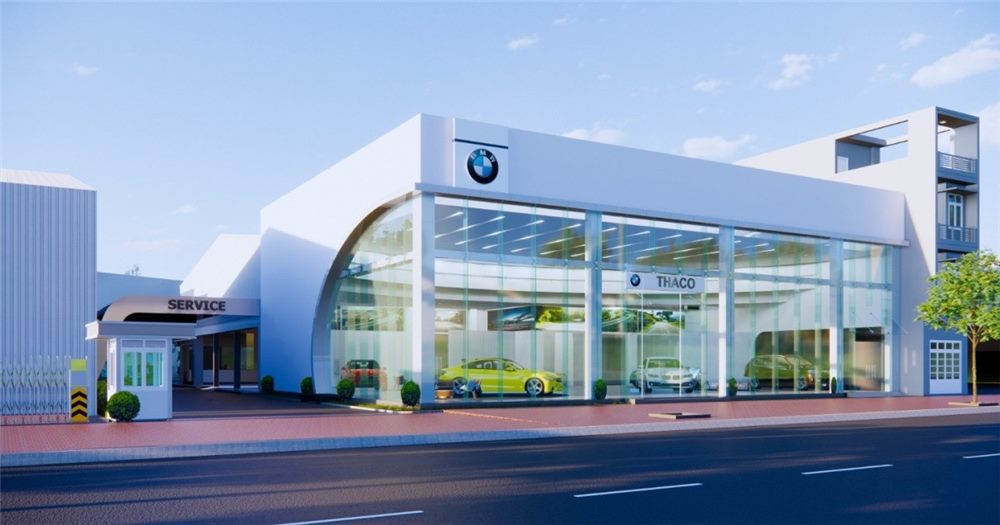 Phối cảnh showroom ô tô mặt dựng trắng, mảng kính rộng và logo hãng