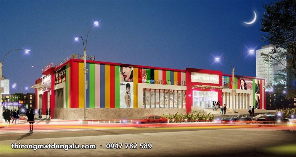 Phối cảnh ban đêm trung tâm thương mại hai tầng mặt dựng sọc màu đỏ vàng xanh