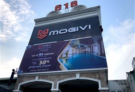 Bảng hiệu Mogivi và bạt quảng cáo khổ lớn văn phòng bán hàng dự án De Capella