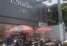 Mặt tiền cửa hàng điện thoại và xe điện: F.Studio, Ken iPhone, YADEA